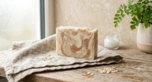 Slice of cold process palm oil free vegan soap bar showing natural marbled swirl pattern.